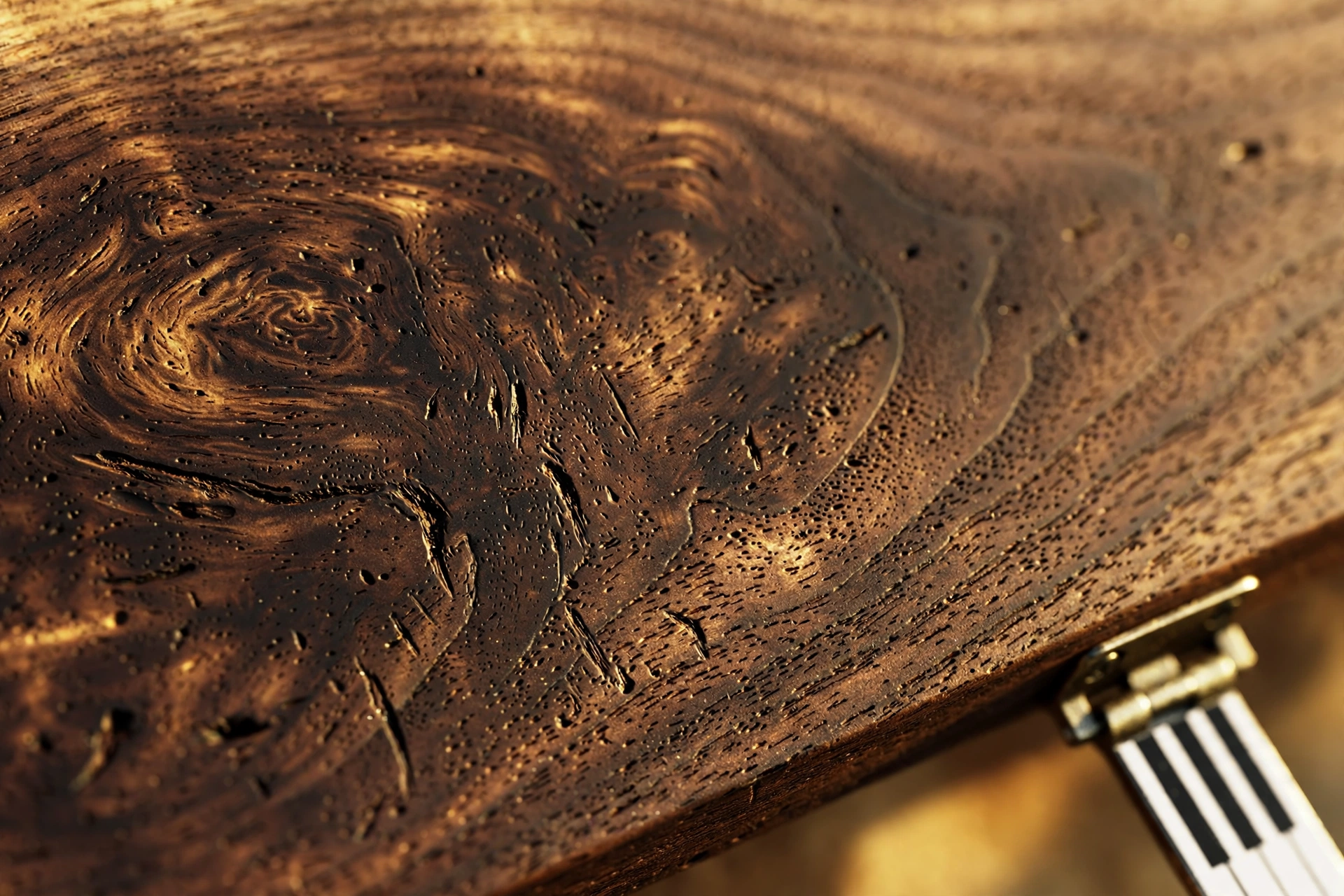 Close-up of rich walnut wood grain on a handmade coat rack board with oil finish